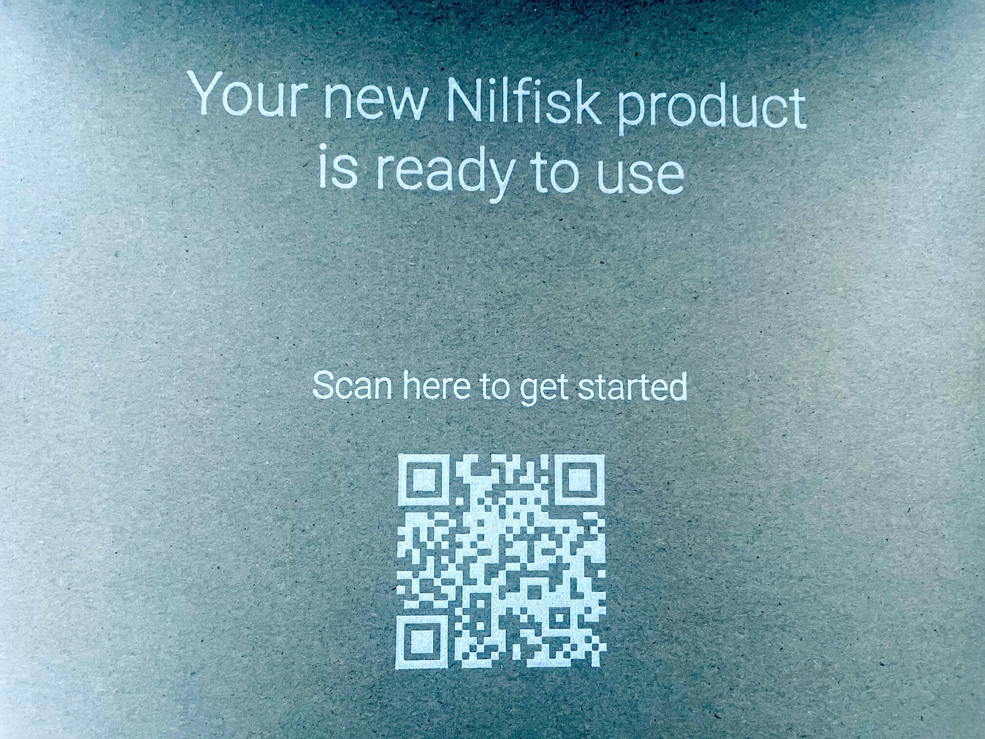 QR kode på kasse med Nilfisk S1 Pet Care